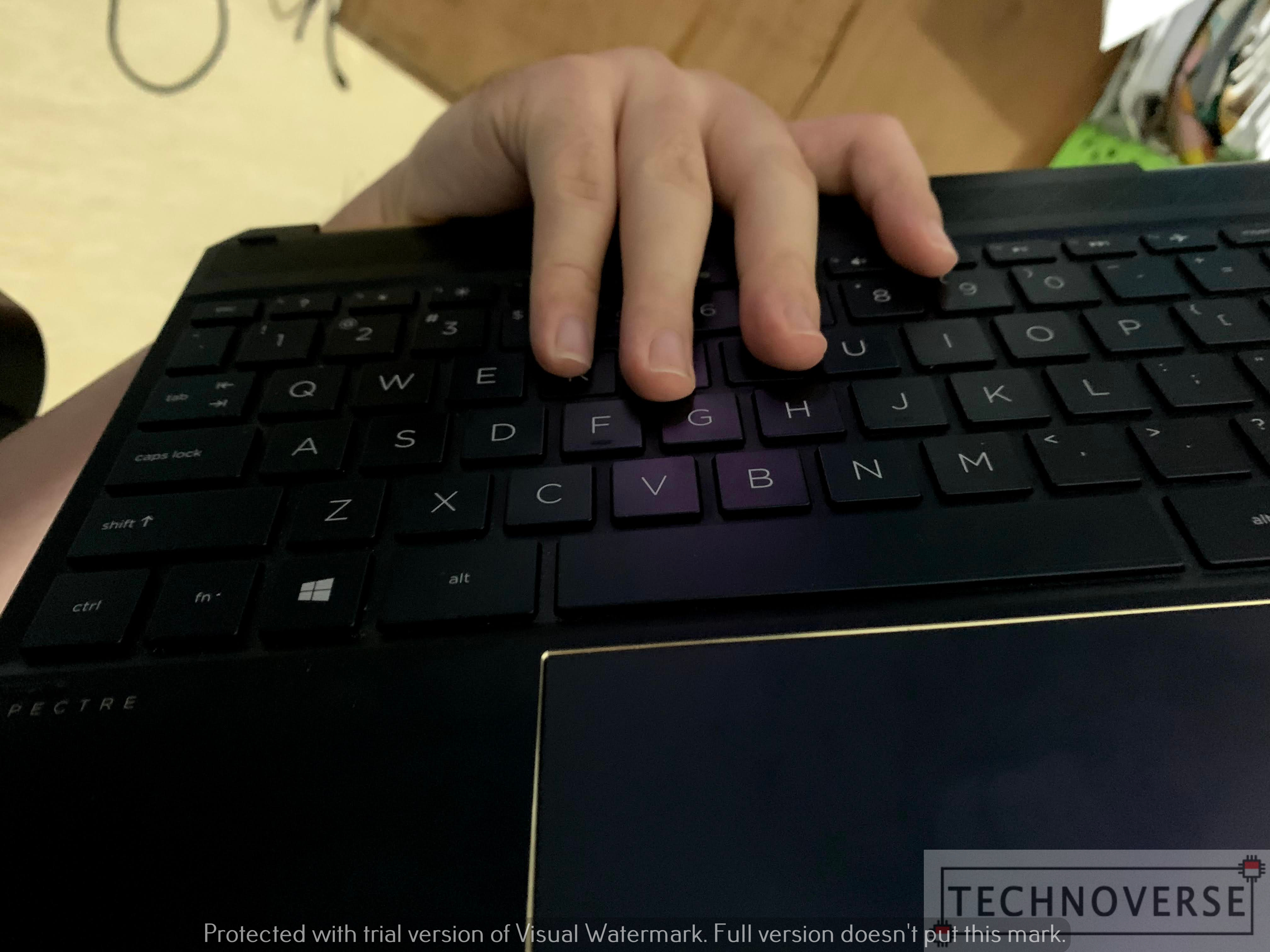 spectre-x360-holding-tablet-keyboard