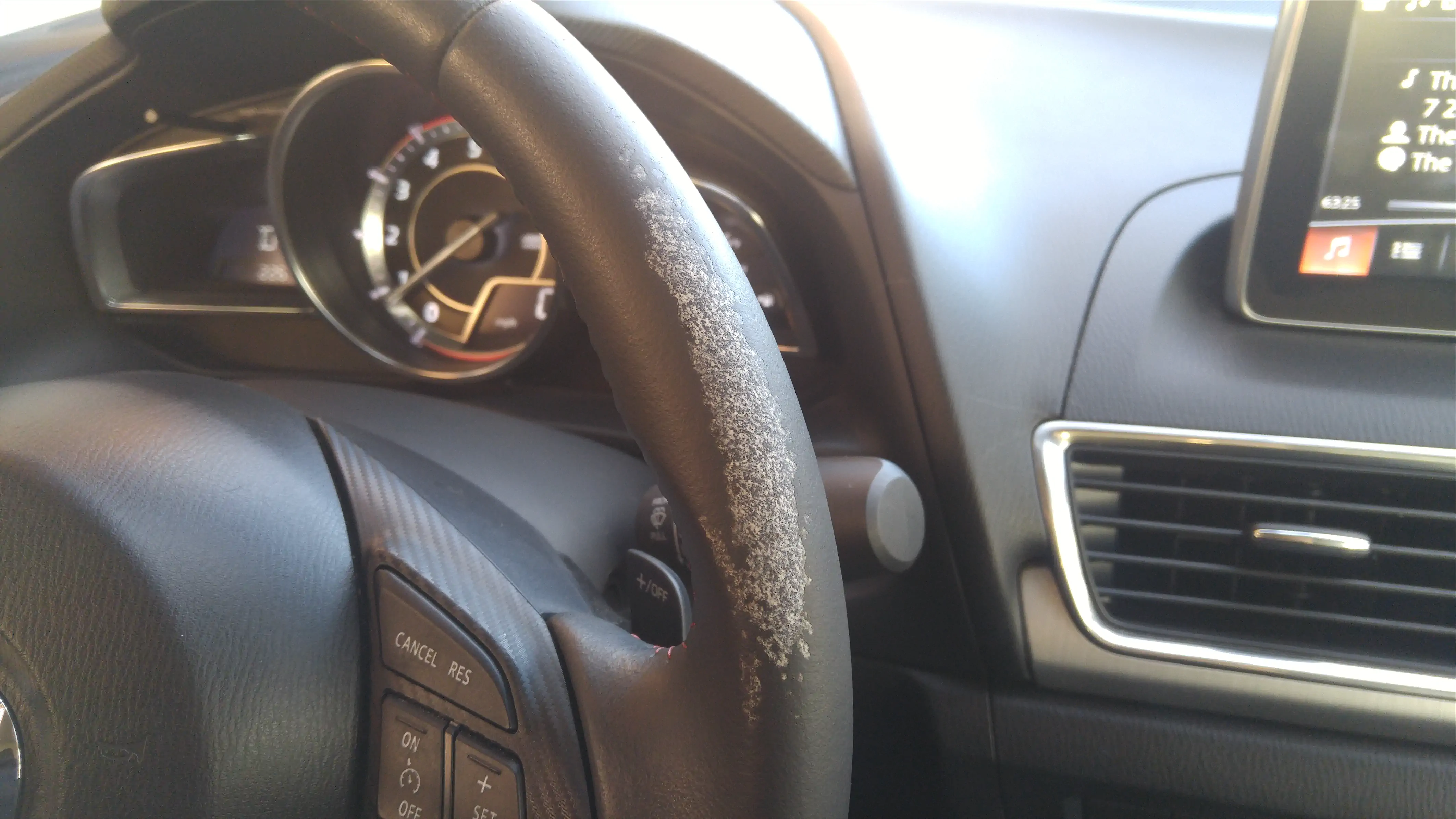 tearing-steering-wheel-leather